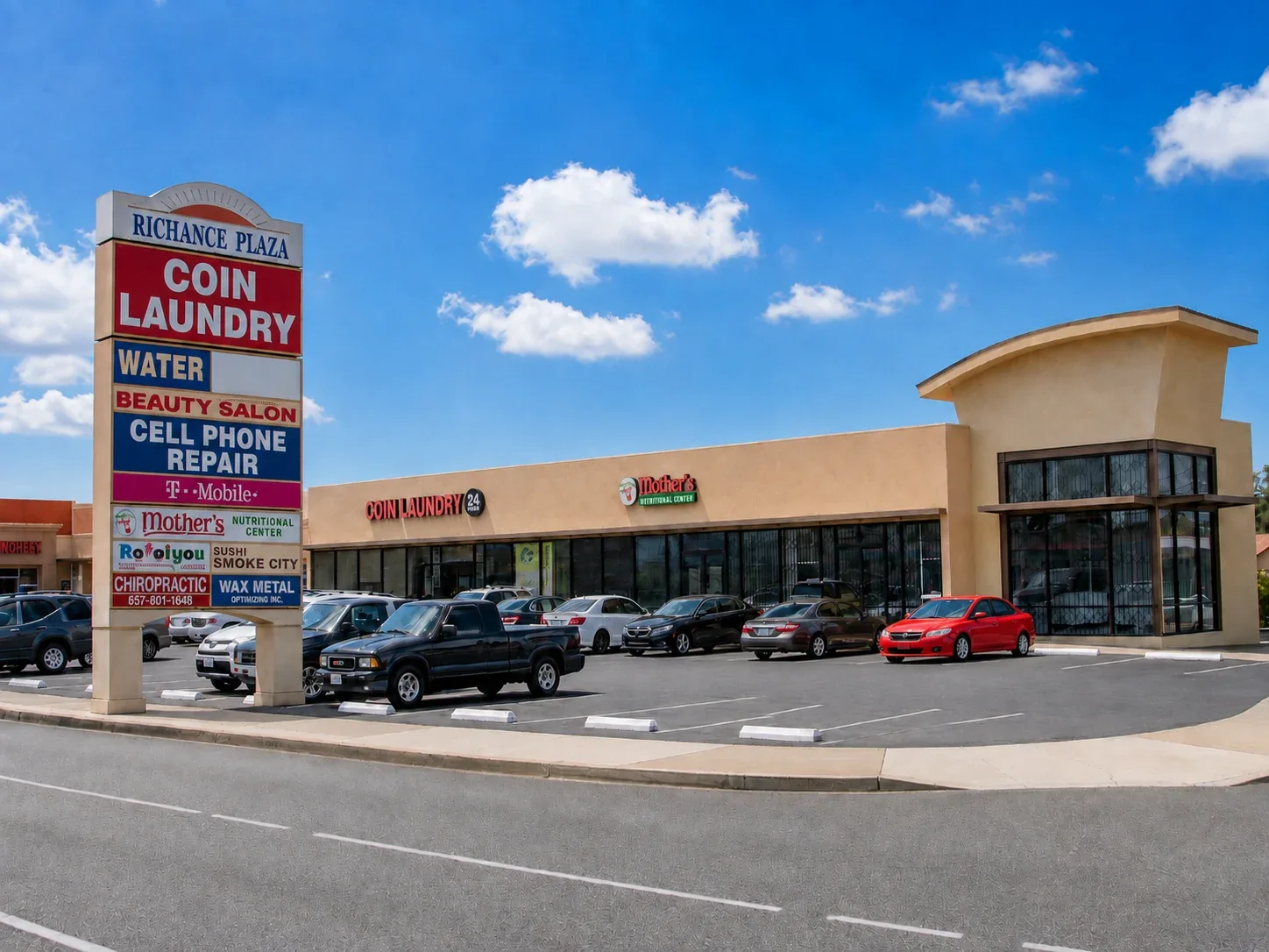 Complete view of Richance Plaza and its roadside sign